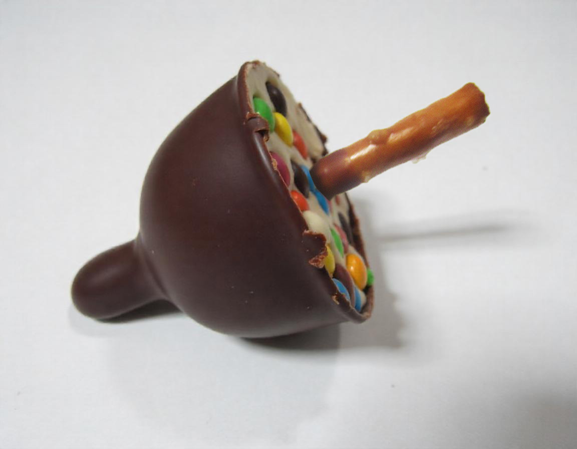 freepik__chocolatecoated-ice-cream-bar-with-candies-embedde__74068.jpg