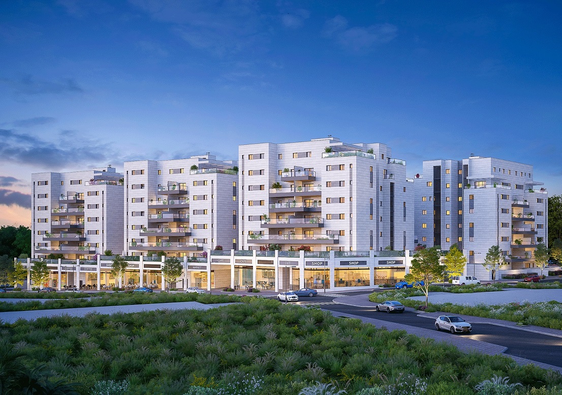 Modern apartment buildings with shops on the ground level.