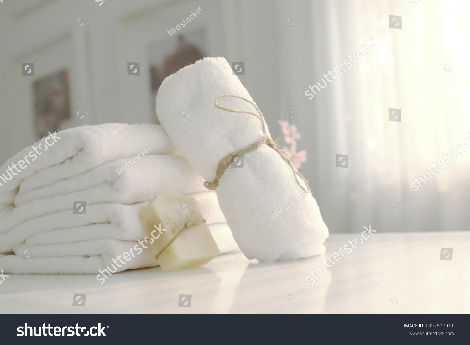 stock-photo-beautifully-folded-white-towels-and-toiletries-luxury-bedroom-in-the-bedroom-bed-hotel-bedroom-1397607911.jpg